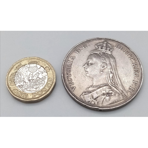 409 - An 1887 Queen Victoria Silver Crown. VF + grade but please see photos.