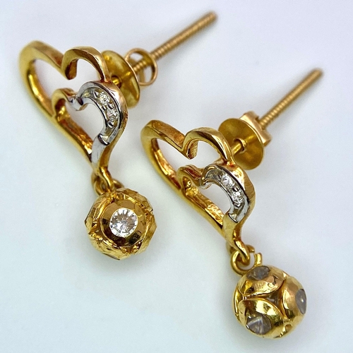 426 - A 18K yellow gold screwback fitting heart drops set Earrings with CZ, 2.5g , 2cm drop.

ref: SH1308I