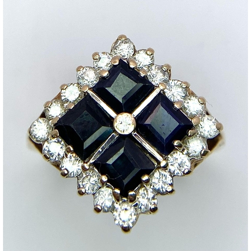 440 - A 9K yellow gold fancy CZ set Ring, 3.7g, size L (black CZ: 4  x 4mm/clear CZ: 20 x 1mm)

ref: SH131... 