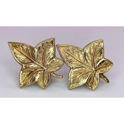 664 - A 9K yellow gold leaf stud earrings, 1.5g

ref: SH1302I-3