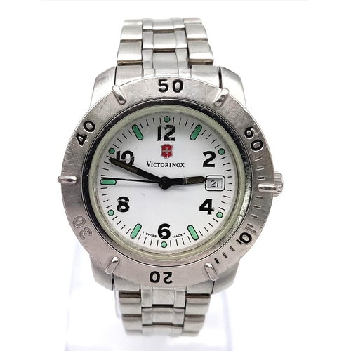 1277 - A Victorinox Swiss Army Quartz Watch. Stainless steel bracelet and case - 32mm. White dial with date... 