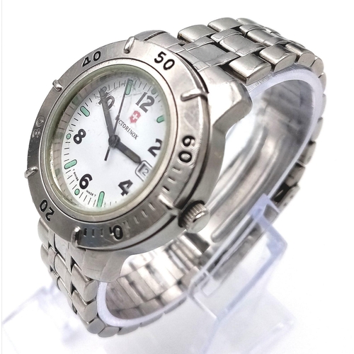 1277 - A Victorinox Swiss Army Quartz Watch. Stainless steel bracelet and case - 32mm. White dial with date... 