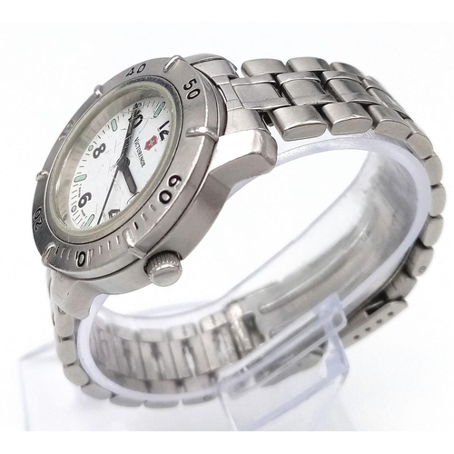 1277 - A Victorinox Swiss Army Quartz Watch. Stainless steel bracelet and case - 32mm. White dial with date... 