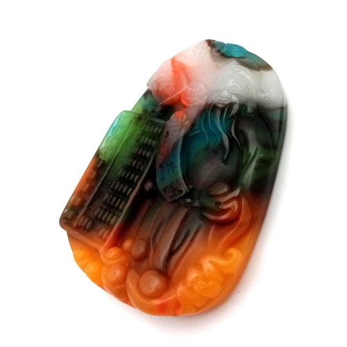 1562 - A Chinese Multi-Colour Jade 'Good Financial Luck' Decorative Abacus Pendant. 5cm.