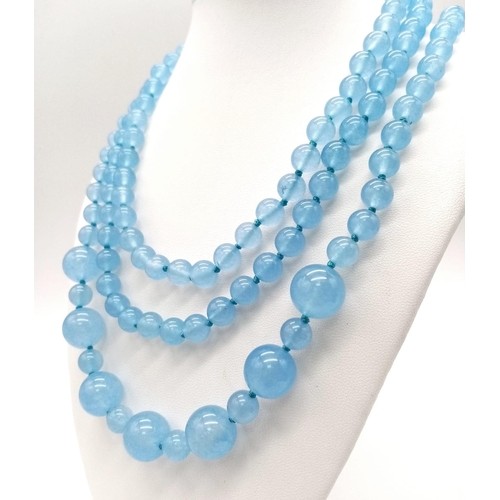 442 - A Rope Length Graduated Blue Jade Bead Necklace. Perfect for different wearing arrangements. 138cm n... 