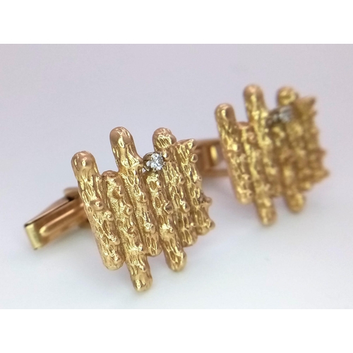 303 - A Vintage Pair of 14k Yellow Gold Bark Effect and Diamond Cufflinks - each with a brilliant round cu... 