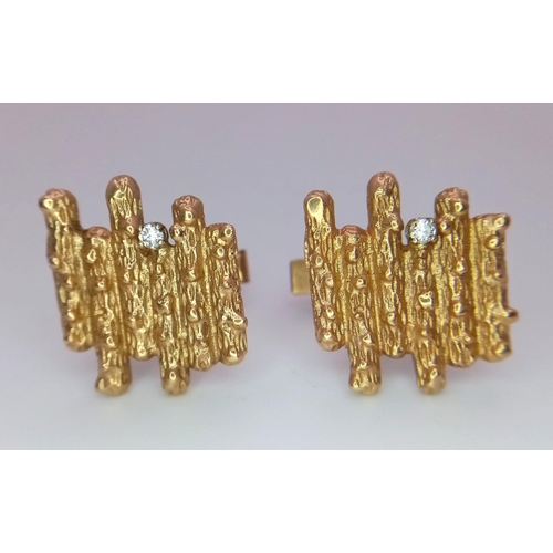 303 - A Vintage Pair of 14k Yellow Gold Bark Effect and Diamond Cufflinks - each with a brilliant round cu... 