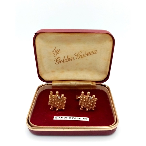 303 - A Vintage Pair of 14k Yellow Gold Bark Effect and Diamond Cufflinks - each with a brilliant round cu... 