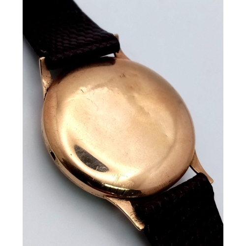 333 - A Vintage Accurist 9K Gold Cased Gents Watch. 21 jewels In need of repair (missing winder) so a/f.