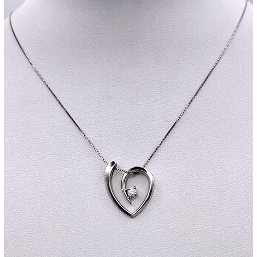 251 - A 18K WHITE GOLD DIAMOND SET HEART ON CHAIN NECKLACE 0.15CT approx 5.5G , 44cm length , 2cm x 1.9cm ... 