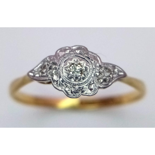 454 - A 18K YELLOW GOLD & PLATINUM VINTAGE DIAMOND RING IN THE FLORAL DESIGN 1.6G SIZE O

ref: SC 1100