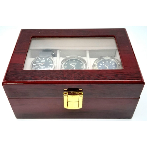 A Parcel of Three Men’s Watches Contained in a Piano Wood Finish Three ...