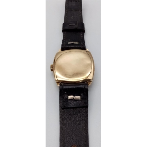 1387 - A Vintage 9K Gold Incabloc Gents Watch with a Courbelin Movement. 17 jewels. Black leather strap. 9k... 