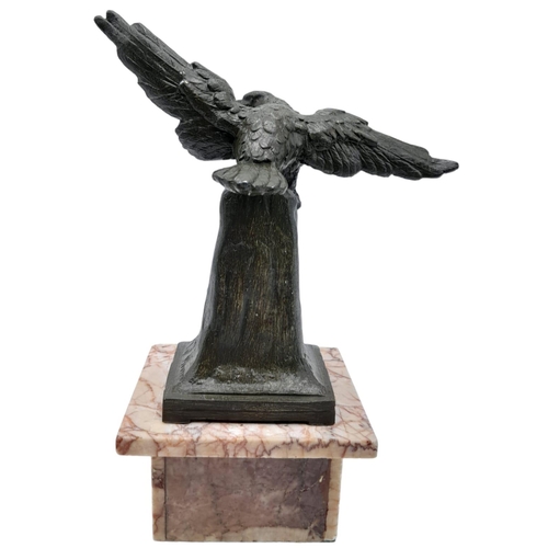 117 - Late War German Spelter Eagle with an Iron Cross 2nd Class and Cap Badge.