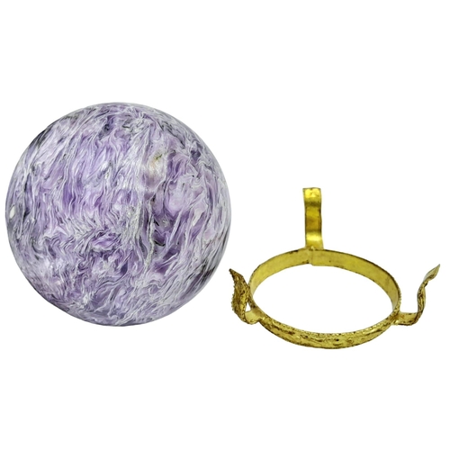 212 - A top quality, totally natural and undyed sphere of CHAROITE on a custom-made gilded metal base. Dia... 