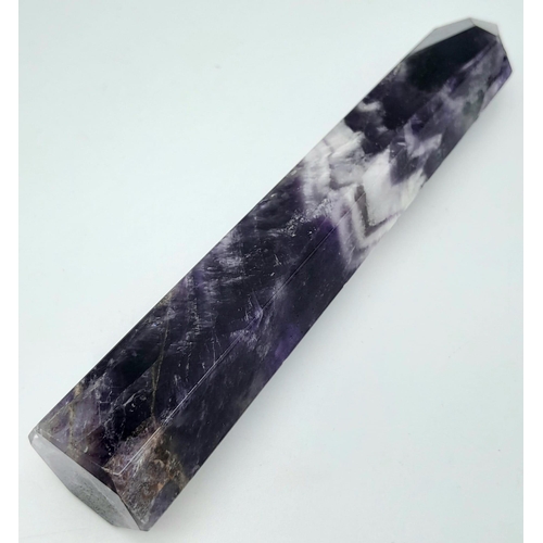 233 - A very collectable, large amethyst crystal, beautifully terminated, exhibiting the “chevron” pattern... 