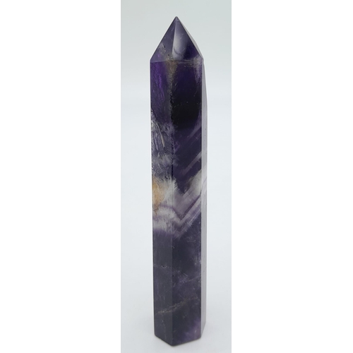 233 - A very collectable, large amethyst crystal, beautifully terminated, exhibiting the “chevron” pattern... 