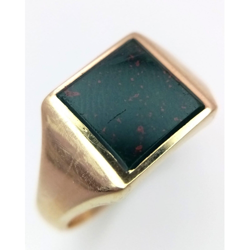 281 - A 9K YELLOW GOLD BLOODSTONE SIGNET RING 6.1G SIZE V

ref: SC 1109