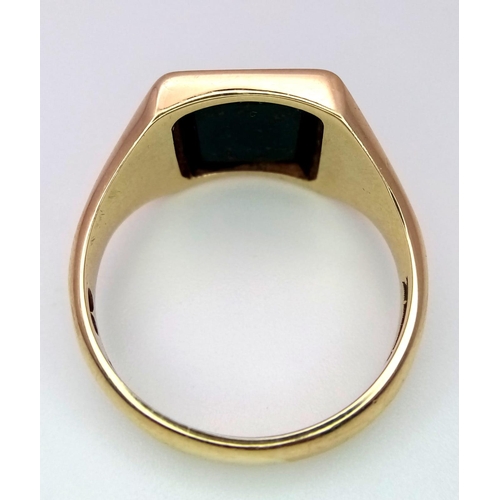 281 - A 9K YELLOW GOLD BLOODSTONE SIGNET RING 6.1G SIZE V

ref: SC 1109