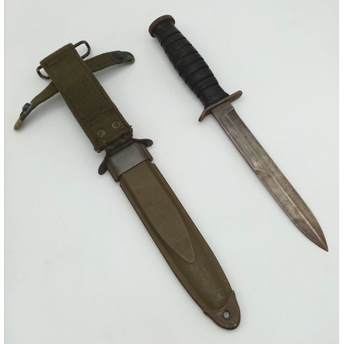 393 - A WW2 US M3 Mk1 Fighting Knife Dated 1943, with M8A1 scabbard. These were issued to the “Shock” Troo... 