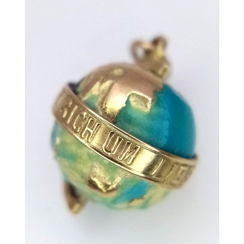 461 - A 14K YELLOW GOLD GLOBE CHARM ENGRAVED IN GERMAN 