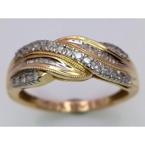 342 - A 14K YELLOW GOLD DIAMOND TWIST RING 0.20CT 3.1G SIZE S

ref: SC 1058