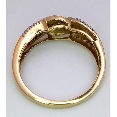 342 - A 14K YELLOW GOLD DIAMOND TWIST RING 0.20CT 3.1G SIZE S

ref: SC 1058