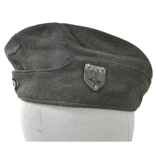 215 - Late WW2 German Overseas Side Cap with Marksman Badge.