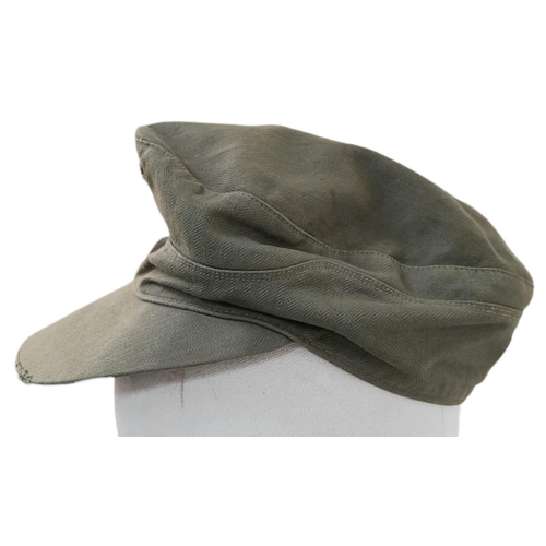 344 - A WW2 German Africa Corps M41 Field Cap. A real “Been There” item. Small Size.