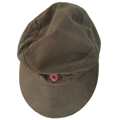 344 - A WW2 German Africa Corps M41 Field Cap. A real “Been There” item. Small Size.