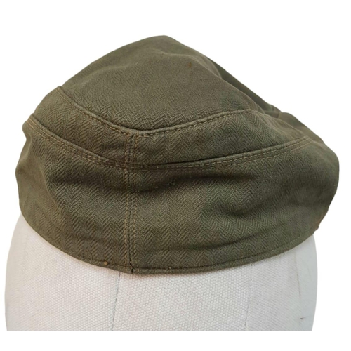 344 - A WW2 German Africa Corps M41 Field Cap. A real “Been There” item. Small Size.