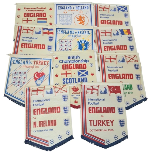 416 - A COLLECTION OF 11 ENGLAND FOOTBALL MATCH PENNANTS FROM DIFFERENT INTERNATIONAL MATCHES , INCLUDING ... 