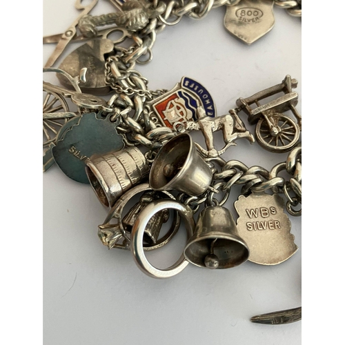 49 - Vintage SILVER CHARM BRACELET Absolutely packed with charms ,having many unusual pieces, To include ... 