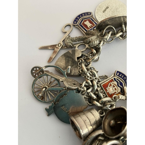 49 - Vintage SILVER CHARM BRACELET Absolutely packed with charms ,having many unusual pieces, To include ... 