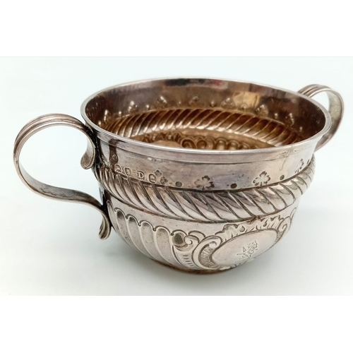 92 - An Antique Georgian Sterling Silver Two-Handled Small Bowl. Chased and Repoussé decoration throughou... 