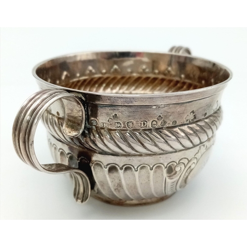 92 - An Antique Georgian Sterling Silver Two-Handled Small Bowl. Chased and Repoussé decoration throughou... 