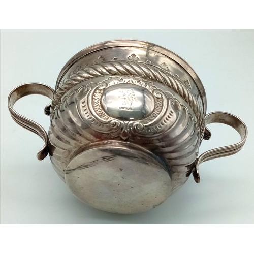 92 - An Antique Georgian Sterling Silver Two-Handled Small Bowl. Chased and Repoussé decoration throughou... 