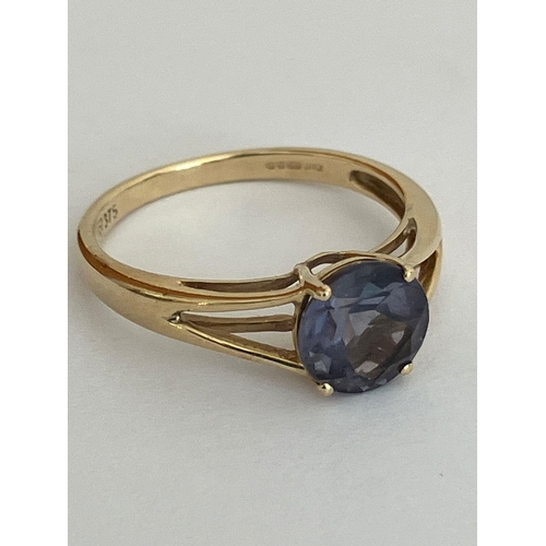 182 - Beautiful 9 carat YELLOW GOLD RING Having (1 carat) TANZANITE round cut and set to top. Full UK hall... 