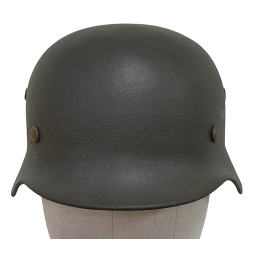 390 - A WW2 German Luftwaffe Single Decal M35 Helmet with liner.