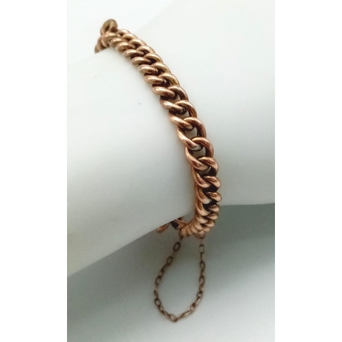 417 - A vintage, 9 K rose gold chain bracelet with security chain. Clasp in good working order. weight: 6.... 