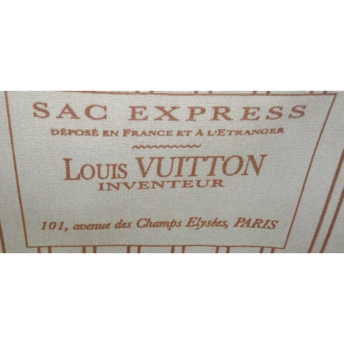 422 - A LOUIS VUITTON PURPLE OSTRICH SAC EXPRESS GM PURSE LIMITED EDITION ONLY USED A COUPLE OF TIMES , IN... 