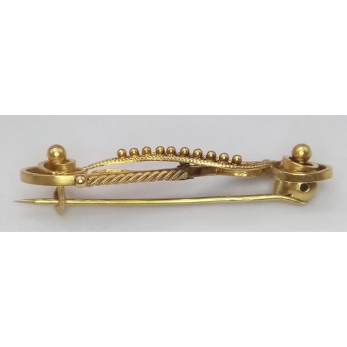 424 - A beautifully made 9 K yellow gold brooch, length: 42 mm, weight; 3.2 g.