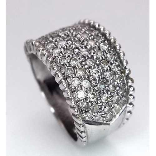 34 - A 18K WHITE GOLD DIAMOND ENCRUSTED BAND RING 0.75CT 10.1G SIZE M 1/22

ref: 6538