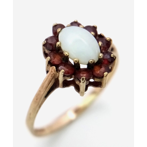 864 - A 9K YELLOW GOLD GARNET & OPAL CLUSTER RING 1.3G SIZE K 1/2

ref: SC 1035