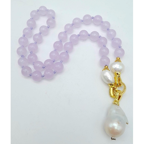 418 - A Lavender Jade Bead Necklace with a Large Keshi Baroque Pearl Pendant (detachable) and Pearl Accent... 