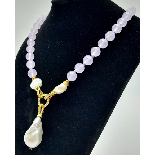 418 - A Lavender Jade Bead Necklace with a Large Keshi Baroque Pearl Pendant (detachable) and Pearl Accent... 