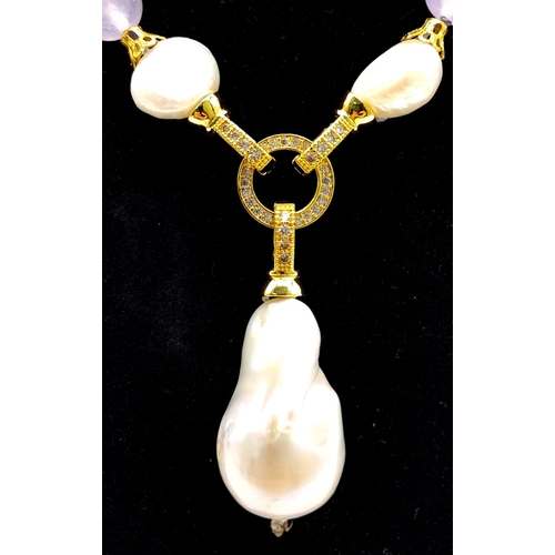 418 - A Lavender Jade Bead Necklace with a Large Keshi Baroque Pearl Pendant (detachable) and Pearl Accent... 