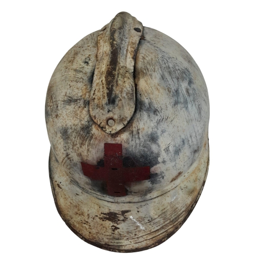 467 - A WW1 French Medics 1915 Model Adriane Helmet with liner. A real “Been There” item.