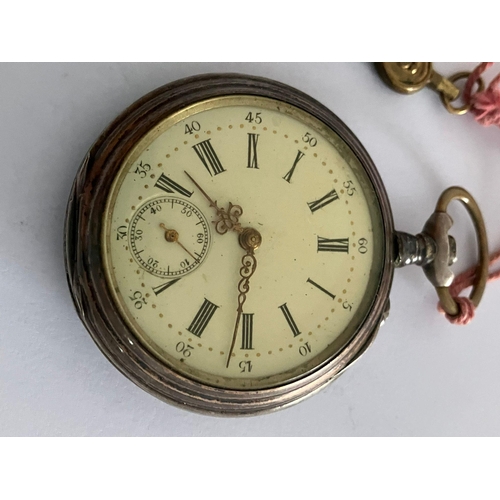 322 - Gentlemans antique SILVER POCKET WATCH. Continental Silver with unusual key wind to top. Having Roma... 