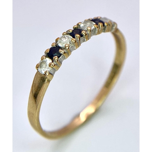 1079 - A Vintage 9K Yellow Gold, White and Blue Stone Ring. Size K. 
1g total weight.